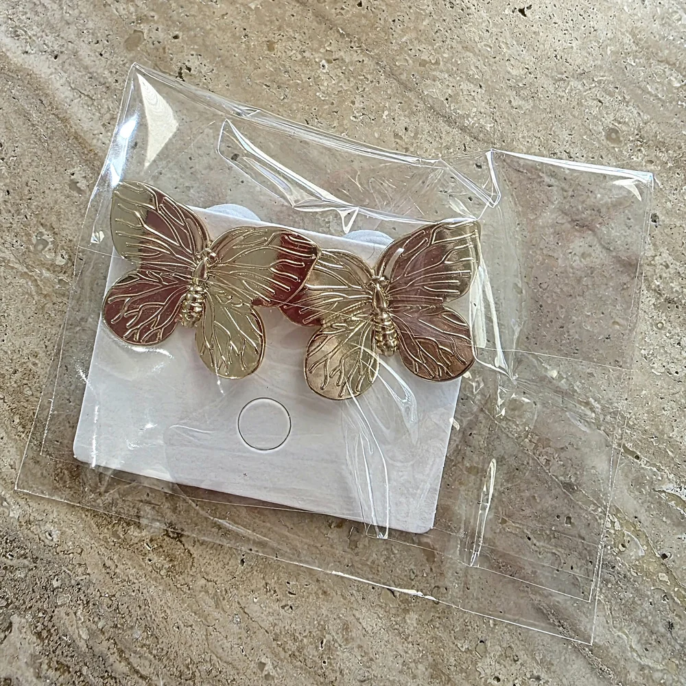 NWOT Elegant Gold Butterfly Earrings